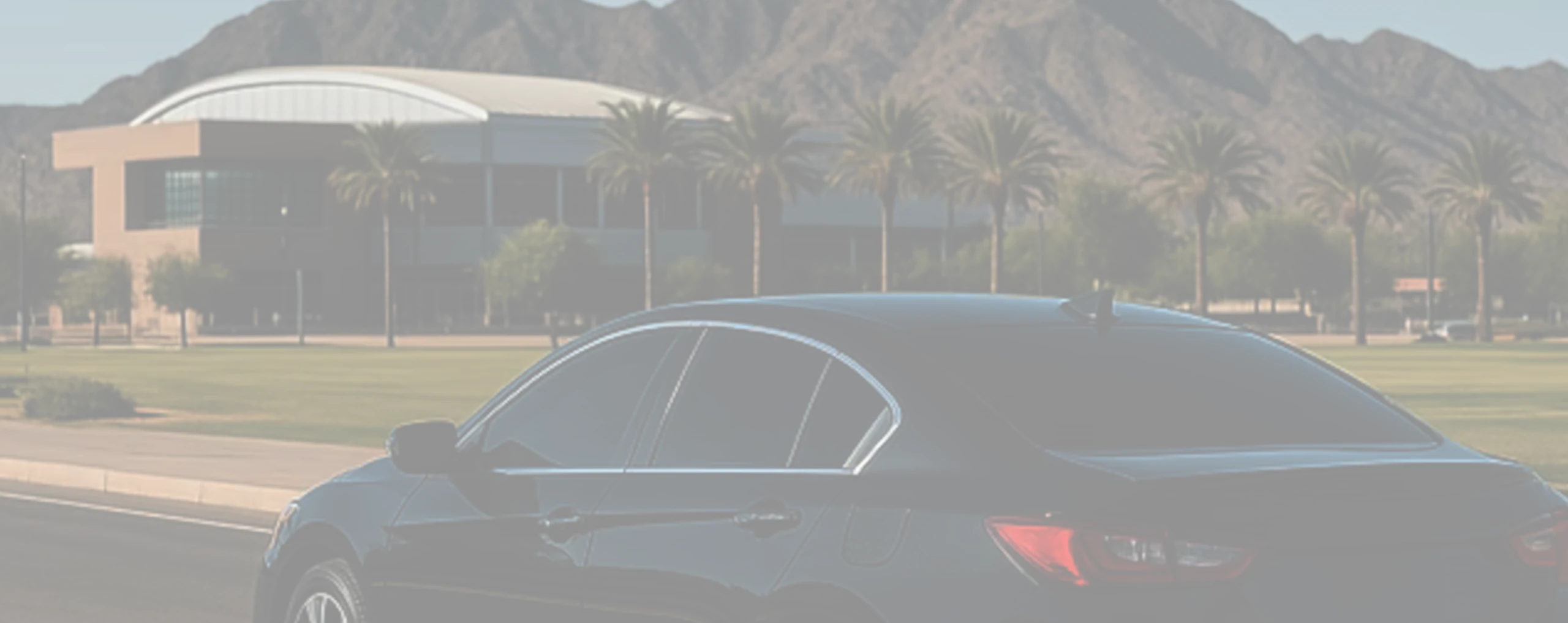 a tinted car at a sports field in goodyear
