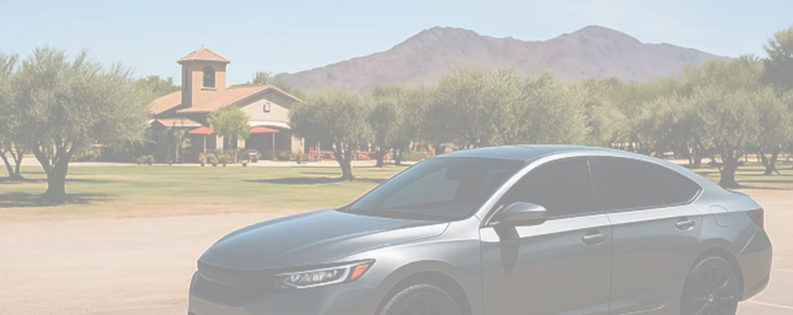 a tinted car in a queen creek parking lot