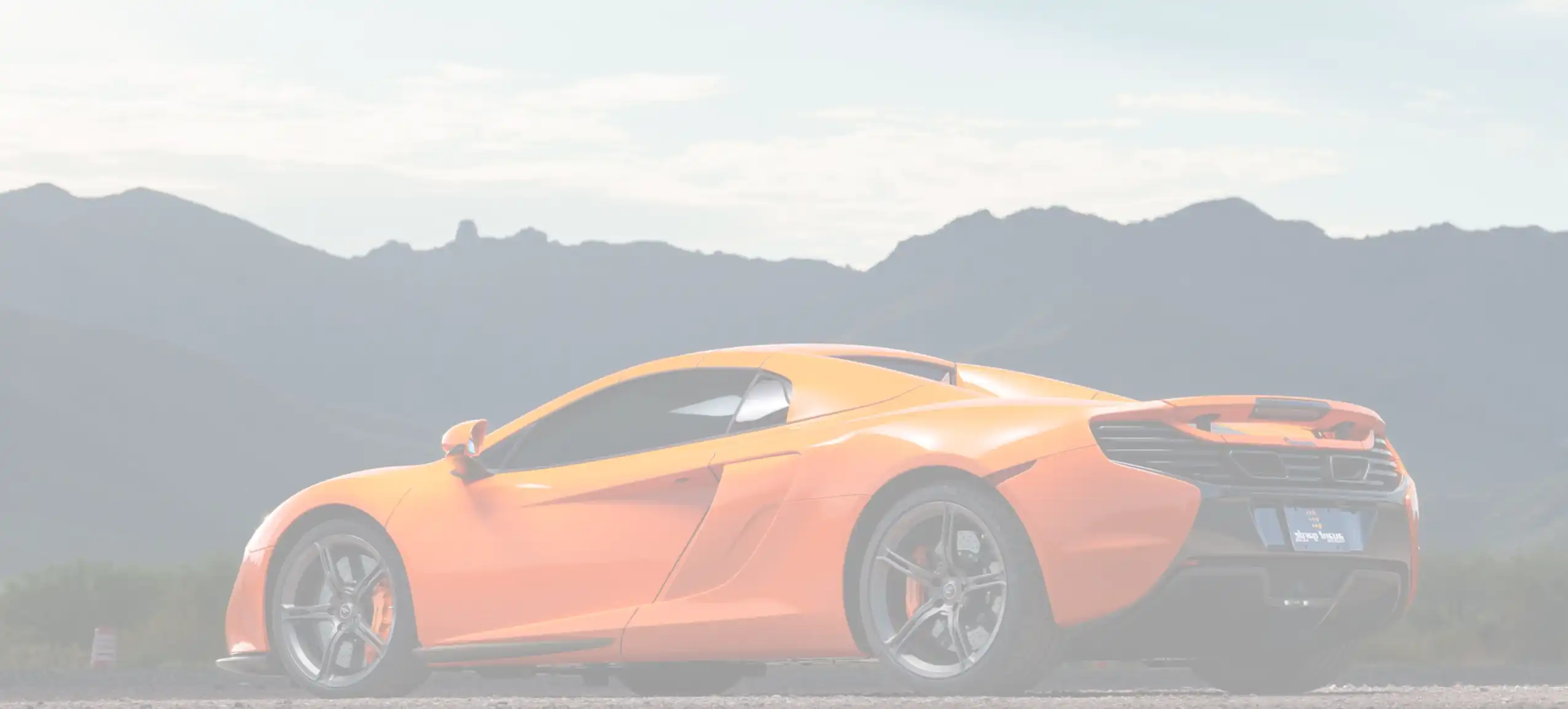 Different types of automotive window tint film samples compared side by side, from clear to dark shades